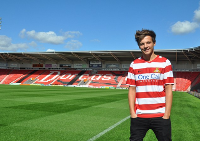 One Direction - Louis Tomlinson signs for Doncaster Rovers